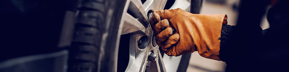 Mechanic Changing Tire Mechanic Changing Tire