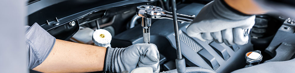 Mechanic Working On Car Mechanic Working On Car
